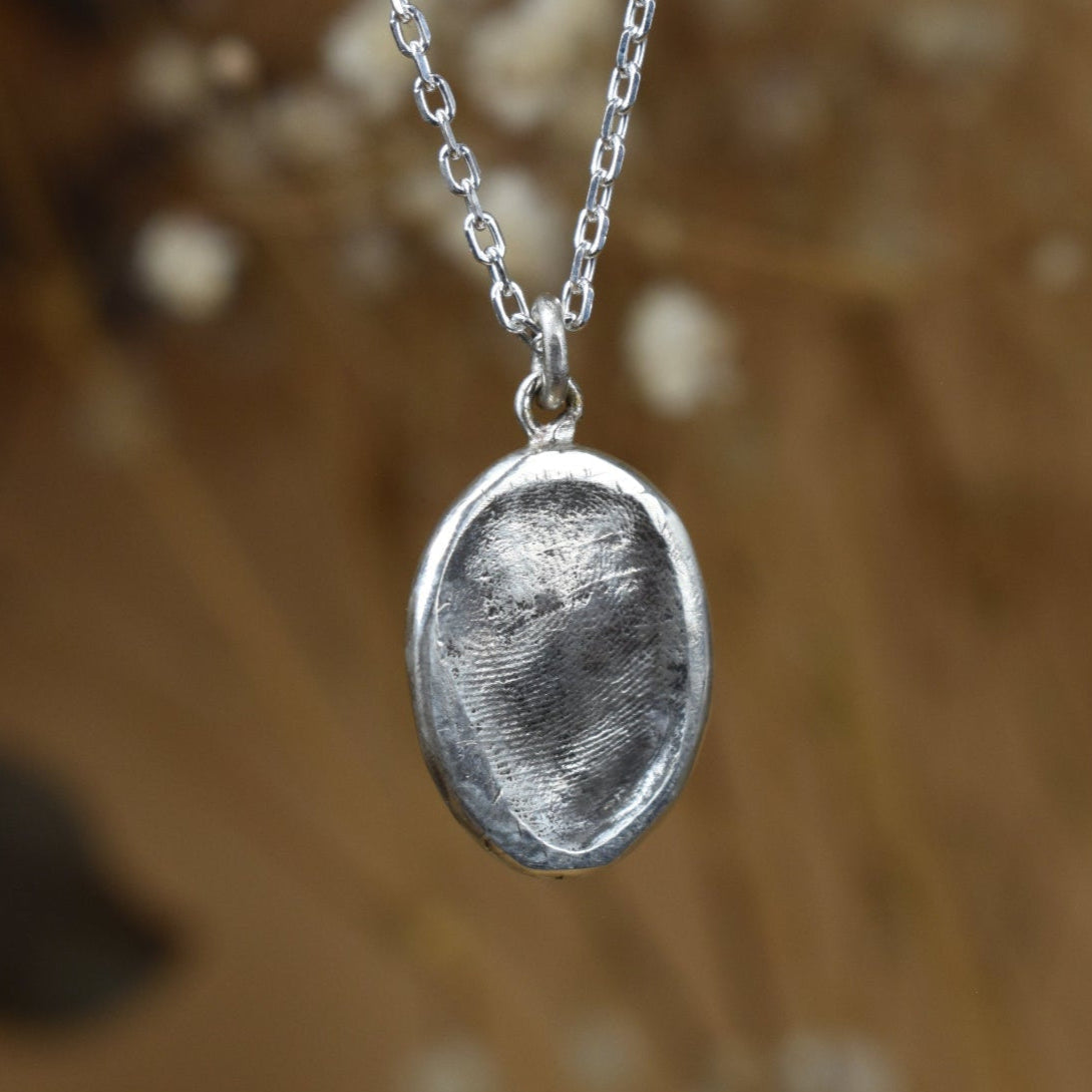 Pendentif empreinte bébé argent philoculus artisanal 